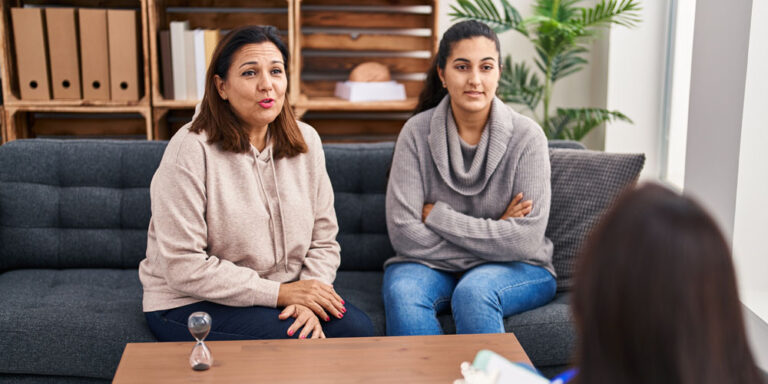 Three woman mother and daughter having therapy session