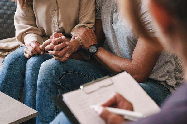 couple having therapy session in room