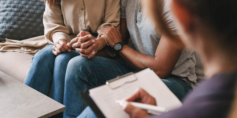 couple having therapy session in room