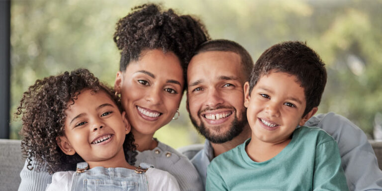 Happiness, mother and father smiling with young Latino kids
