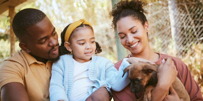 Happy family, animal shelter and dog with girl and parents bond