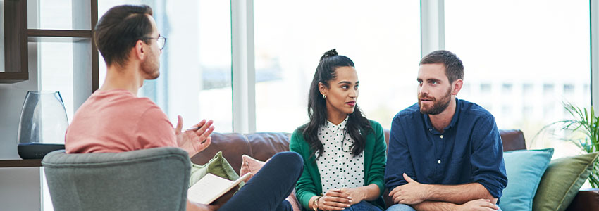 Couple, relationship and marriage with therapy, office and discussion with communication